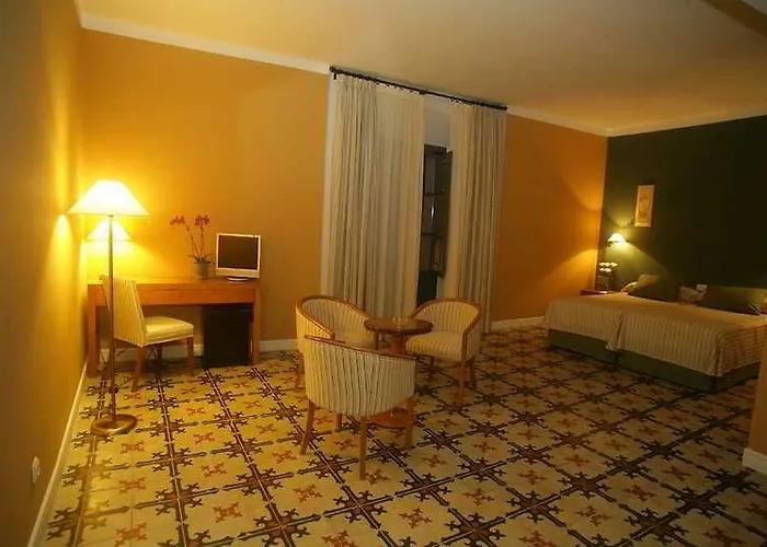 Отель Ahc Palacio Кориа