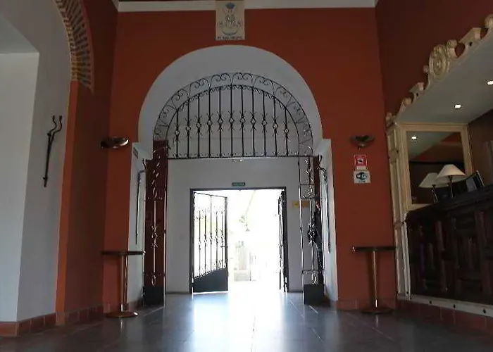 Отель Ahc Palacio Кориа